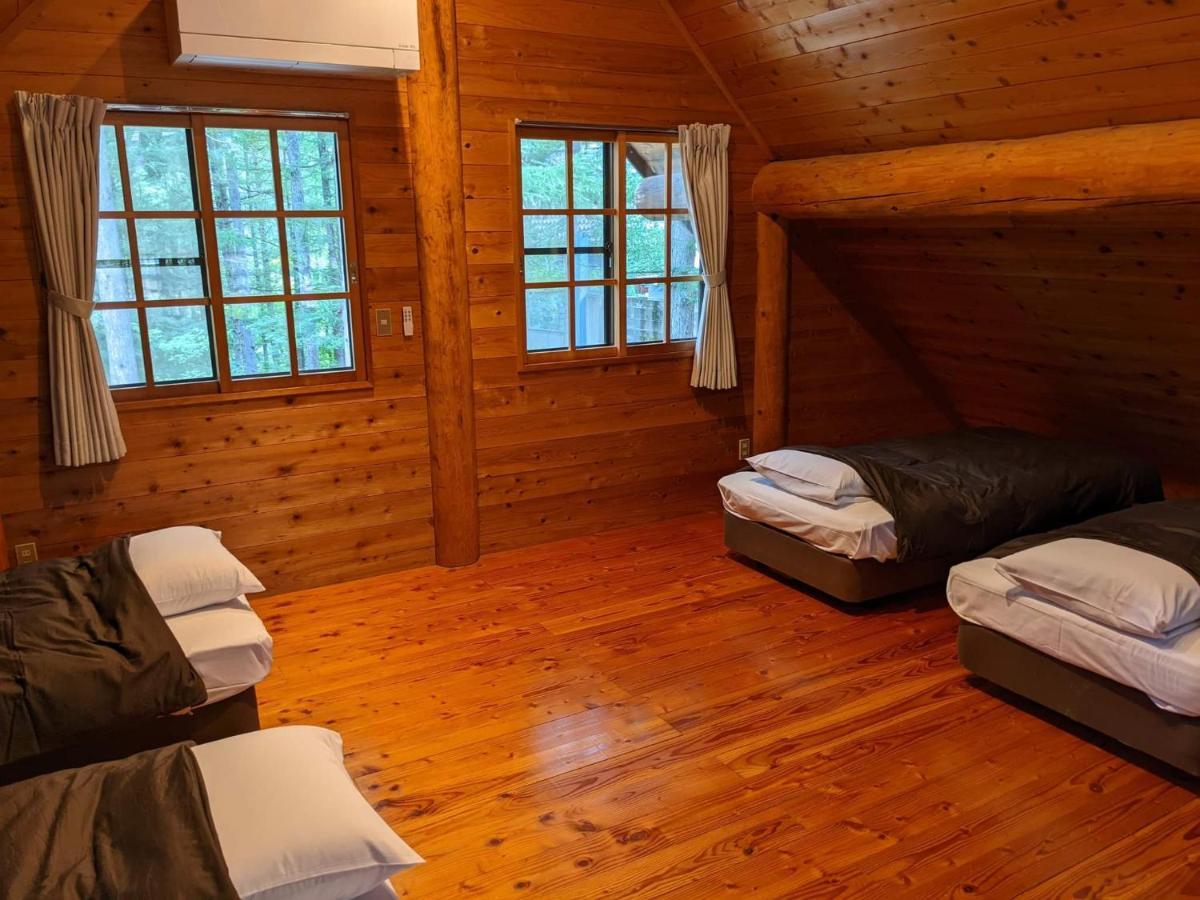 Апарт отель White Tree Log House Madarao Tangram Shinano  Экстерьер фото