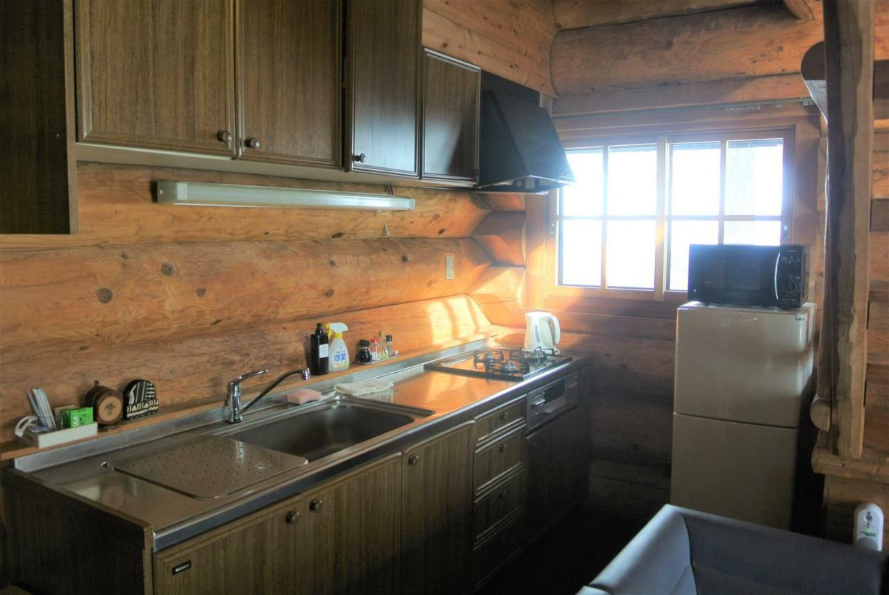 Апарт отель White Tree Log House Madarao Tangram Shinano  Экстерьер фото